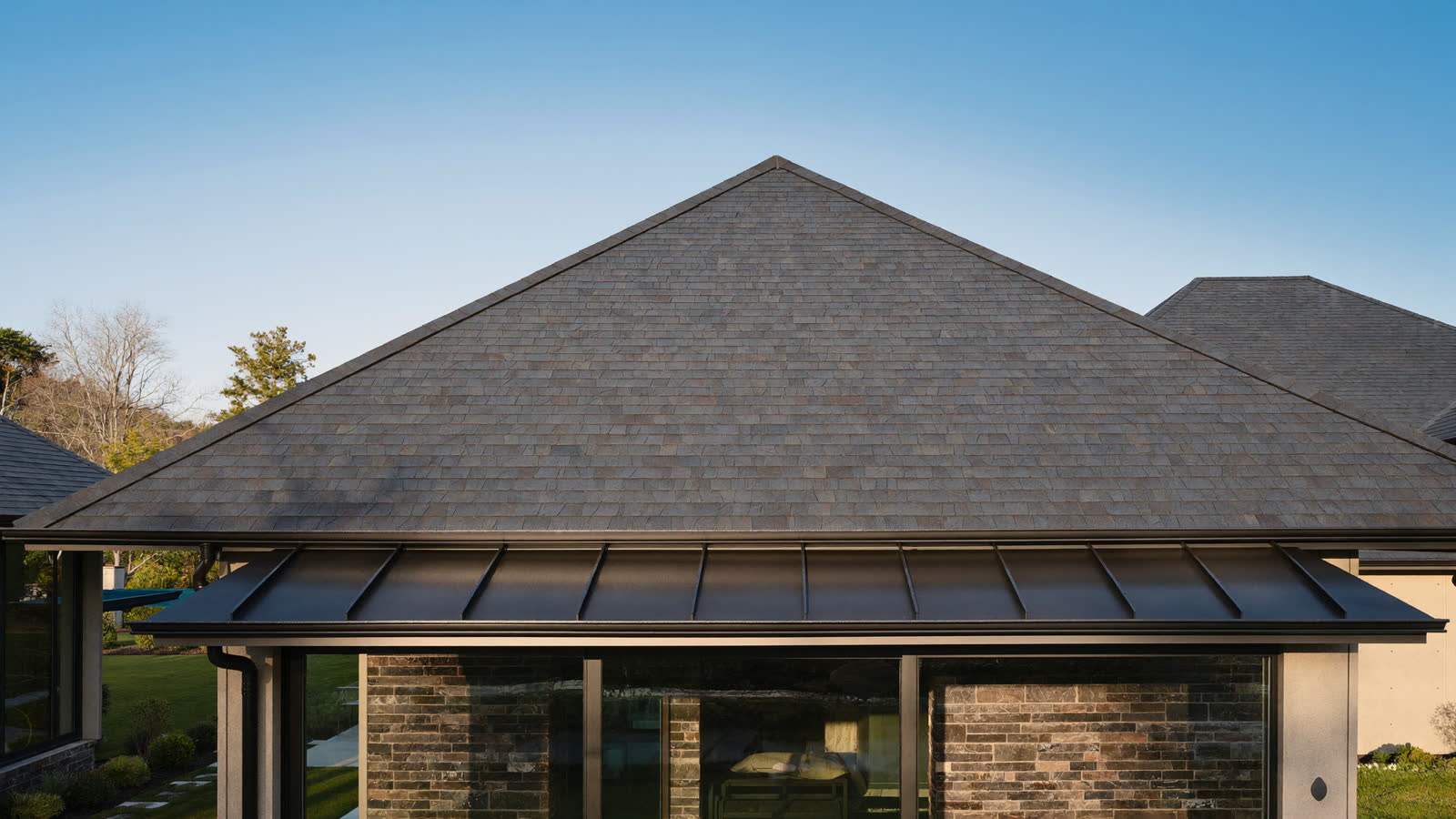 Completed architectural shingle roof on a ranch home in Ballwin